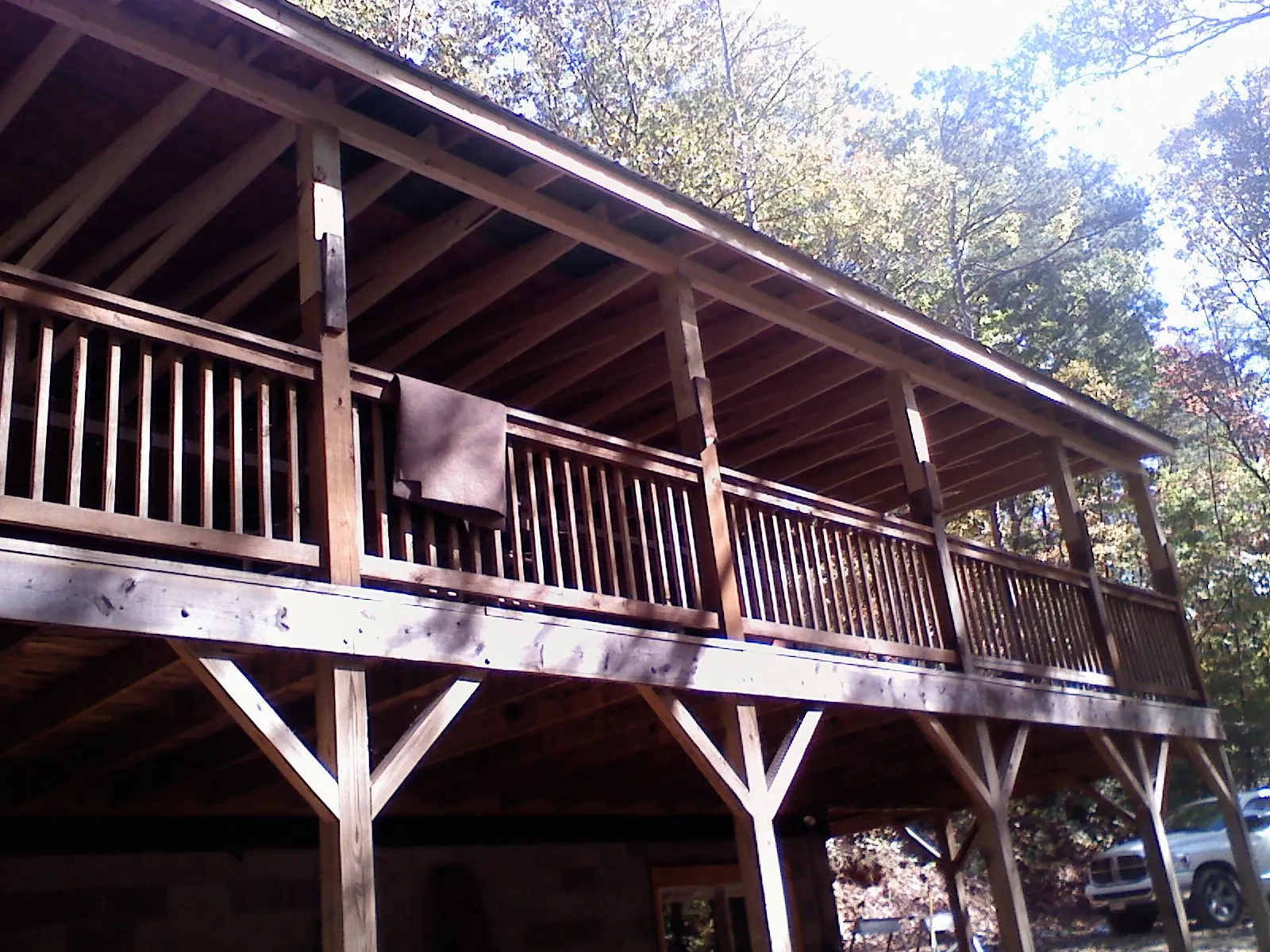 Timber framing under a new elevated porch and deck — Roof Leak Repair in Big Bear Lake by Roofing Brothers